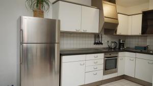 Kuchyň nebo kuchyňský kout v ubytování Gemütliches Apartment in Bad Berneck + 10 fotografií