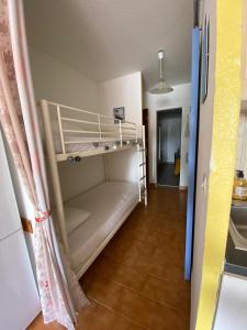 Posteľ alebo postele v izbe v ubytovaní Port Cros Appartement