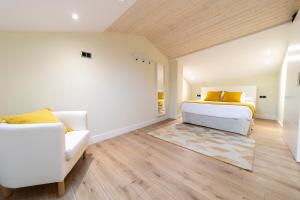 Postel nebo postele na pokoji v ubytování Apartamentos San Lazaro