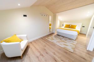 Postel nebo postele na pokoji v ubytování Apartamentos San Lazaro