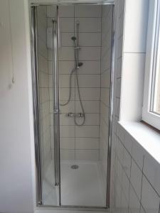 Koupelna v ubytování Appartements au bord de la rivière