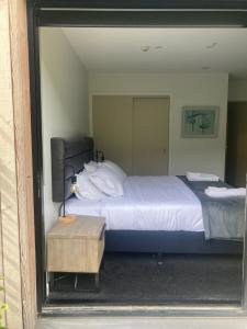 Postel nebo postele na pokoji v ubytování Garden Apartment