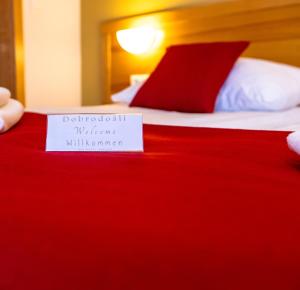 Postelja oz. postelje v sobi nastanitve Hotel Bau Maribor