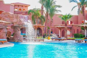a pool at a resort with a water park at Charmillion Sea Life Resort in Sharm El Sheikh