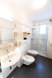 Kopalnica v nastanitvi Hotel Bau Maribor
