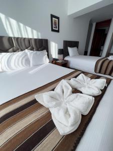Postel nebo postele na pokoji v ubytování Hotel Andes de Urubamba