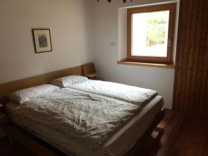 A bed or beds in a room at VILLA LA BRISA 2