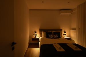 Postel nebo postele na pokoji v ubytování Luxury Downtown Apartment C2