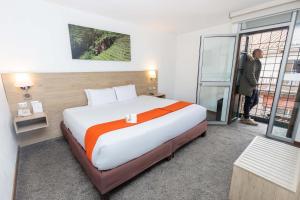 Кровать или кровати в номере Casa Andina Standard Cusco Catedral