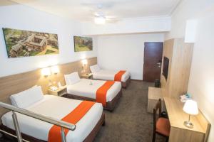 Кровать или кровати в номере Casa Andina Standard Cusco Catedral