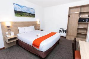 Кровать или кровати в номере Casa Andina Standard Cusco Catedral