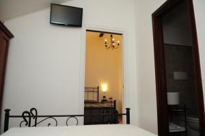 TV a/nebo společenská místnost v ubytování Hotel Dei Templi