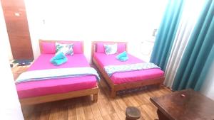 Postel nebo postele na pokoji v ubytování MJ Home