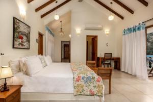 Postel nebo postele na pokoji v ubytování Casa de Amor + 37 fotografií
