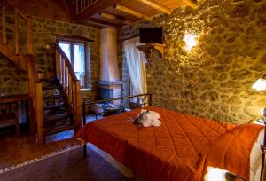 Posteľ alebo postele v izbe v ubytovaní Pigi Tarlampa Hotel