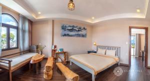 Postel nebo postele na pokoji v ubytování Guava Hill Boutique Hotel