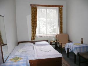 Postel nebo postele na pokoji v ubytování Apartment Trojska