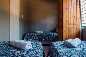 Säng eller sängar i ett rum på Farm stay at Lavender Cottage on Haldon Estate