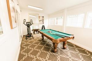 a room with a pool table in it at Luxury Sport & Gym Vacation House 10 Guests 5BR 2000sqft in San Jose