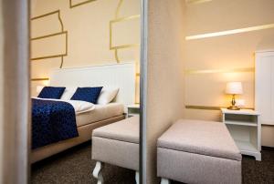 Posteľ alebo postele v izbe v ubytovaní Zámecký Hotel ANTON FLORIAN