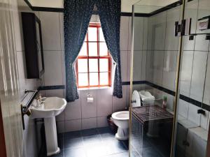 Salle de bains dans l'établissement Trumpetters Drift Game Farm