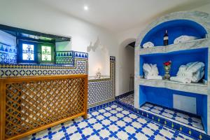 Postel nebo postele na pokoji v ubytování Riad Rcif & Spa Originale