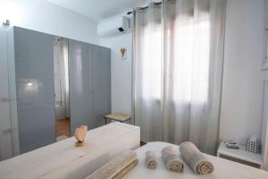 A bed or beds in a room at La Casa di Orimari Még 28 kép