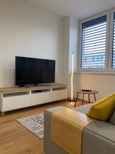 A television and/or entertainment centre at LUXURY LIVING