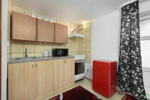 Η κουζίνα ή μικρή κουζίνα στο Stone Gate Apartment #3 +5 φωτογραφίες