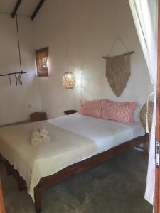 Uma cama ou camas num quarto em Maria Bonita Sri Lanka