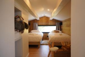 Fotografie z fotogalerie ubytování L'Etincelle Mountain Lodge v destinaci Chamrousse + 48 fotografií