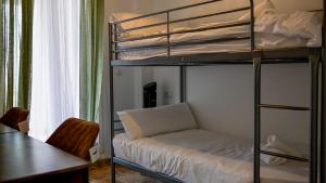 a bedroom with a bunk bed with a desk and a tableablish at Ground Floor Apartment with Three Bed on La Torre Golf - AO1402 in Torre-Pacheco