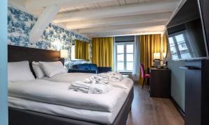 Postel nebo postele na pokoji v ubytování Thon Hotel Kristiansund