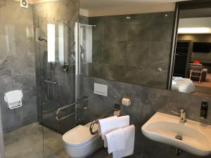 Koupelna v ubytování Kongres Hotel Roca