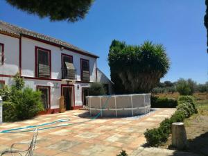 una casa siendo remodelada con una manguera en Las maravillas de Manuel By Solymar Holiday, en Málaga