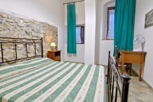 Ένα ή περισσότερα κρεβάτια σε δωμάτιο στο Villa Very