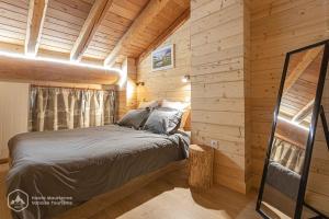Chalet Le Bois Joli客房内的一张或多张床位