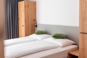 All-Suite Resort Fieberbrunn inklusive Gästekarte & Lauchsee-Eintritt客房内的一张或多张床位