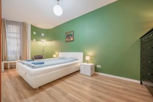 Posteľ alebo postele v izbe v ubytovaní Modern Apartment With Garage