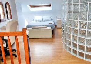 a room with a wall of wine bottles at Casa Donaire in Marganell