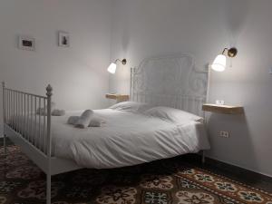 Ένα ή περισσότερα κρεβάτια σε δωμάτιο στο Alli Rotti Guest House