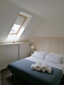 Postel nebo postele na pokoji v ubytování Erkel Rooftop Suites