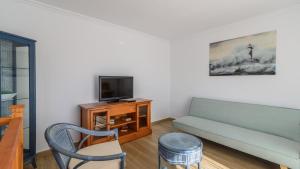Televízia a/alebo spoločenská miestnosť v ubytovaní Villa Isabel Vélez-Málaga by Ruralidays