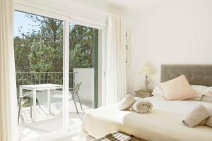 Posteľ alebo postele v izbe v ubytovaní Villa Esquina Luxury 5 Bed 5 Bath Pollensa