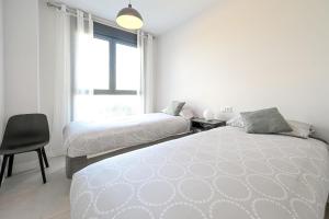 Postel nebo postele na pokoji v ubytování Modern 3 bedroom apartment + 21 fotografií