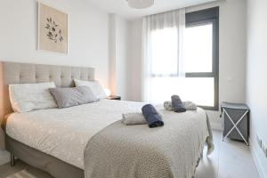 Postel nebo postele na pokoji v ubytování Modern 3 bedroom apartment