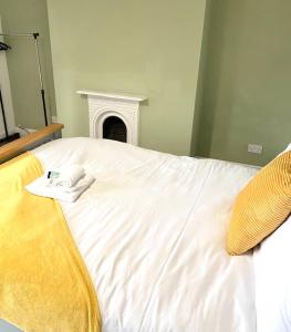 Ένα ή περισσότερα κρεβάτια σε δωμάτιο στο Northern Lodge