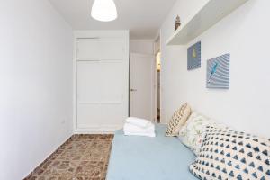 Łóżko lub łóżka w pokoju w obiekcie Home2Book Ocean Breeze Candelaria, Terrace & Pool