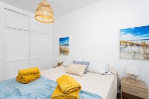 Łóżko lub łóżka w pokoju w obiekcie Home2Book Ocean Breeze Candelaria, Terrace & Pool