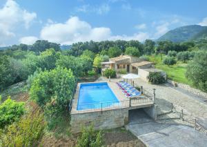 an aerial view of a villa with a swimming pool at Owl Booking Villa Sedes - Dive Into Nature in Campanet